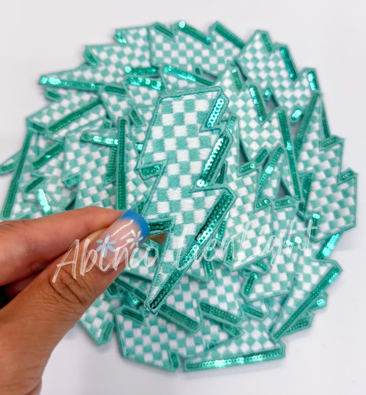 Turquoise teal checkered lightning bolt filler patch iron on