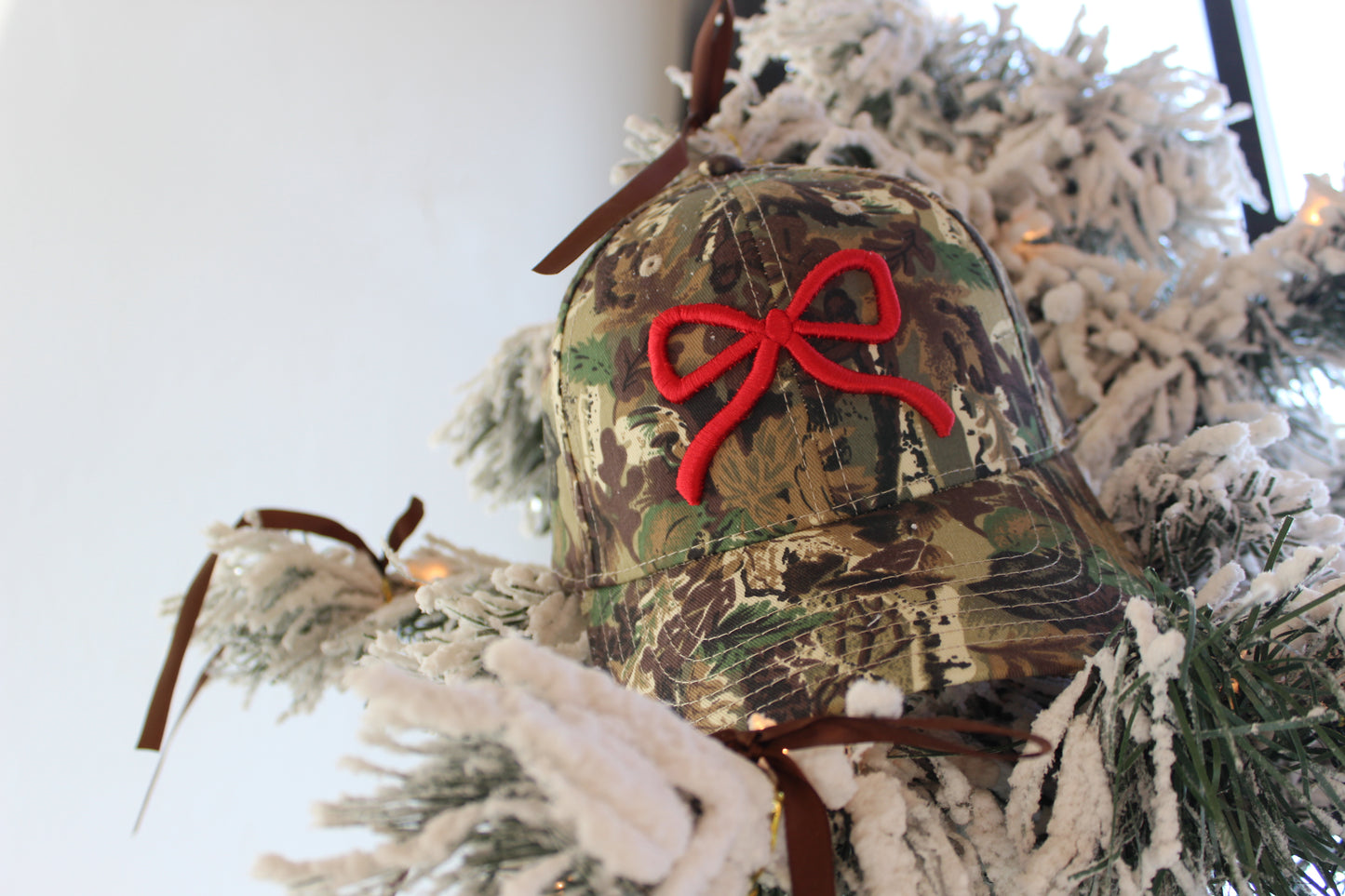 Puff Bow Camo Trucker Hat